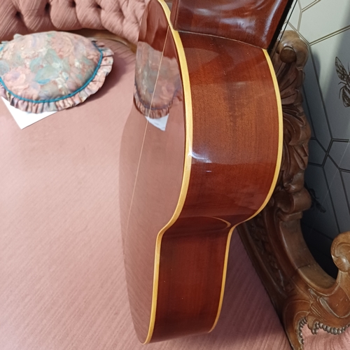 105 - Concert Grande Spanish Classical Guitar by BM of Spain.  This has a really beautiful sound in excell... 