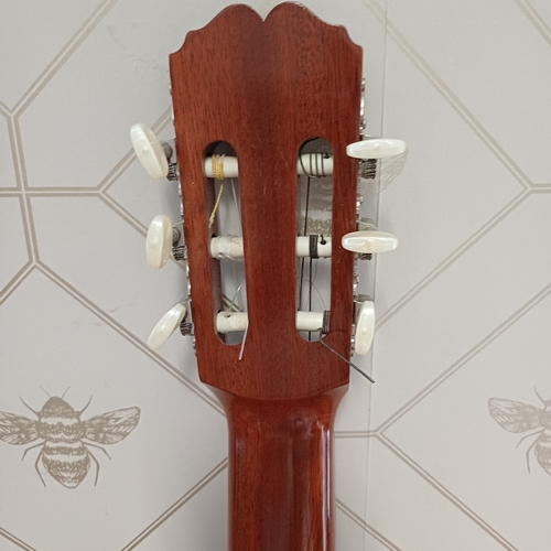 105 - Concert Grande Spanish Classical Guitar by BM of Spain.  This has a really beautiful sound in excell... 