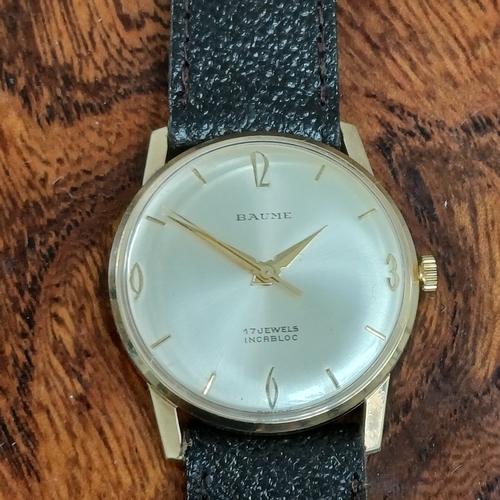 70 - Baume Gents 9 carat gold watch.  This has just been serviced.  This is in working order and in very ... 