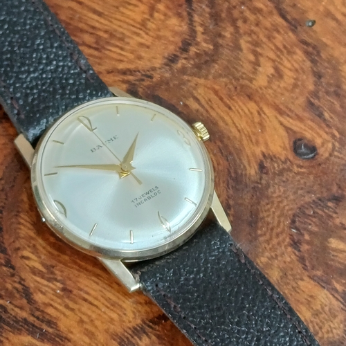 70 - Baume Gents 9 carat gold watch.  This has just been serviced.  This is in working order and in very ... 