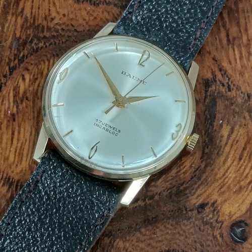 70 - Baume Gents 9 carat gold watch.  This has just been serviced.  This is in working order and in very ... 
