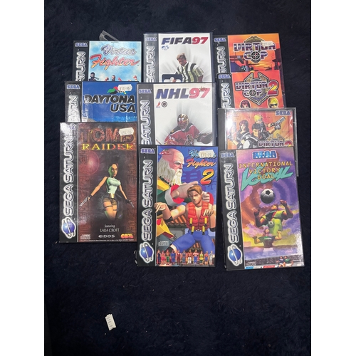 156 - This retro Sega Saturn would be a great addition to any gamers collection! Comes with associated lea...