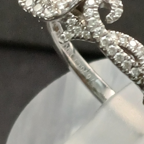 76 - Vera Wang Love Diamond Cluster Ring set in 18 carat white gold.  This is a really pretty ring in its... 