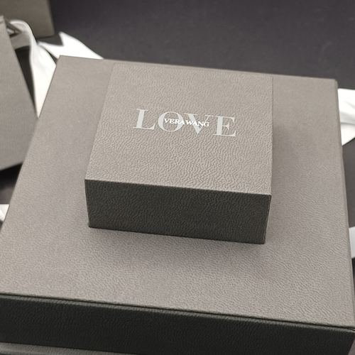 76 - Vera Wang Love Diamond Cluster Ring set in 18 carat white gold.  This is a really pretty ring in its... 