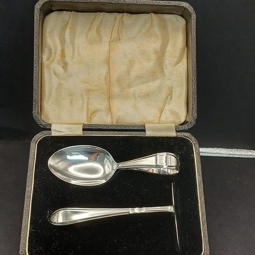 80 - Boxed Silver Baby Pusher and Spoon.  Birmingham Assay for I. S. Greenberg & Co date stamp 1937.   To... 