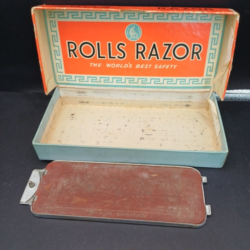 81 - Rolls Razor boxed and in excellent condition.  This product was a type of safety razor known for its... 