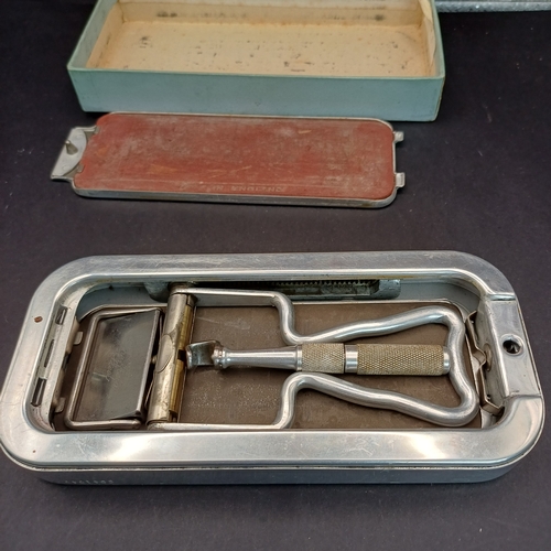 81 - Rolls Razor boxed and in excellent condition.  This product was a type of safety razor known for its... 