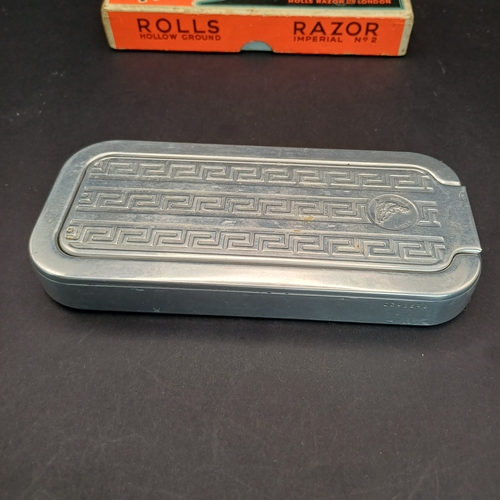 81 - Rolls Razor boxed and in excellent condition.  This product was a type of safety razor known for its... 