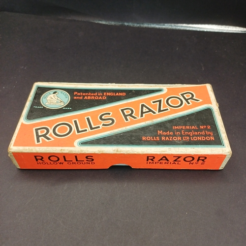 81 - Rolls Razor boxed and in excellent condition.  This product was a type of safety razor known for its... 