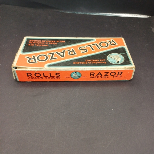 81 - Rolls Razor boxed and in excellent condition.  This product was a type of safety razor known for its... 