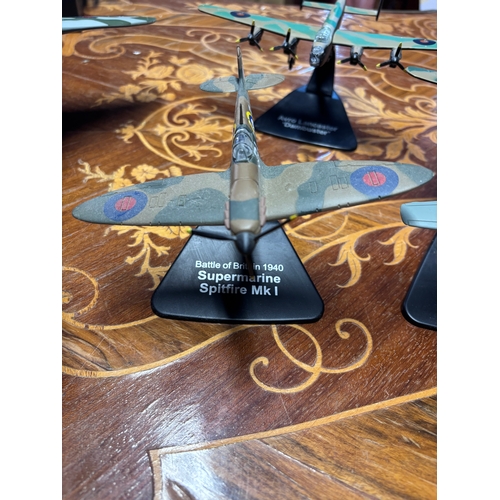 78 - Collection of model diecast planes. 
Avro Vulcan
Messerschmitt Bf 109E-4 x2 
1942 spitfire
Avro Lanc... 