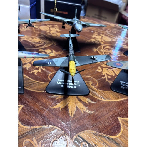 78 - Collection of model diecast planes. 
Avro Vulcan
Messerschmitt Bf 109E-4 x2 
1942 spitfire
Avro Lanc... 