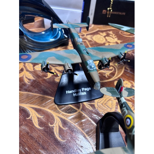 78 - Collection of model diecast planes. 
Avro Vulcan
Messerschmitt Bf 109E-4 x2 
1942 spitfire
Avro Lanc... 