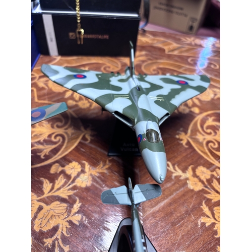 78 - Collection of model diecast planes. 
Avro Vulcan
Messerschmitt Bf 109E-4 x2 
1942 spitfire
Avro Lanc... 