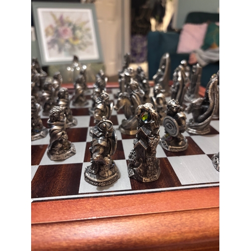 185 - This stunning Lord of the rings chess set by Danbury Mint in pewter and Swarovski crystal. 
Rare fin... 