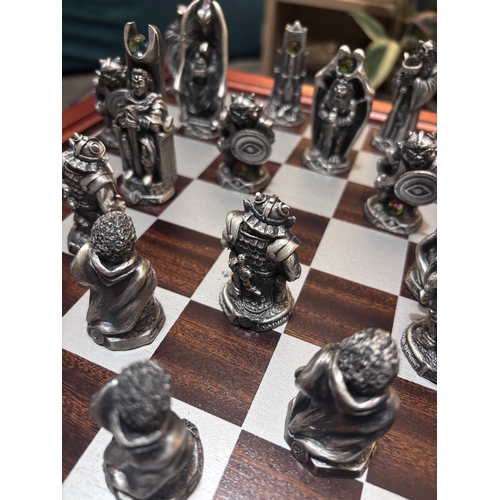 185 - This stunning Lord of the rings chess set by Danbury Mint in pewter and Swarovski crystal. 
Rare fin... 