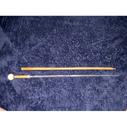 207 - This silver and carved bone sword stick is a rare find. Lovely detailing to the blade. A real stunni... 