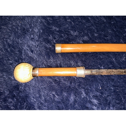 207 - This silver and carved bone sword stick is a rare find. Lovely detailing to the blade. A real stunni... 