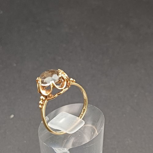 3 - Smoky Quartz Ring set in 9 carat yellow gold.
- size N
- weight 2.4g