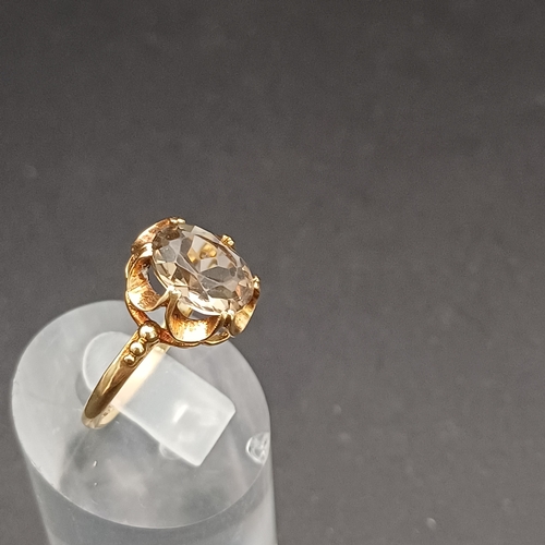 3 - Smoky Quartz Ring set in 9 carat yellow gold.
- size N
- weight 2.4g