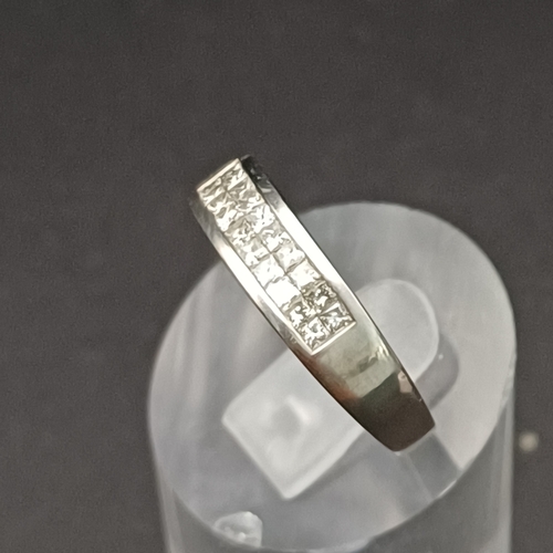 16 - Diamond Half Eternity Ring set in 18 carat white gold.
- weight 5.2g
- size O
- 18 carat white gold