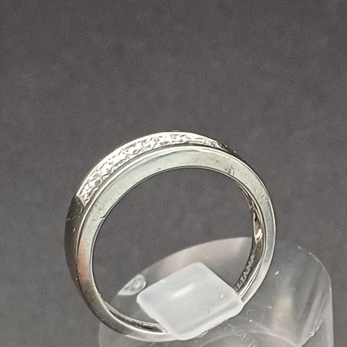 16 - Diamond Half Eternity Ring set in 18 carat white gold.
- weight 5.2g
- size O
- 18 carat white gold