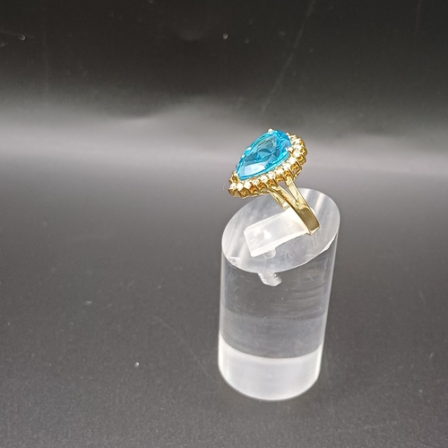 23 - Very beautiful Topaz and Diamond Ring set in 14 carat yellow gold.
- weight 4.4.5g
- 14 carat yellow... 