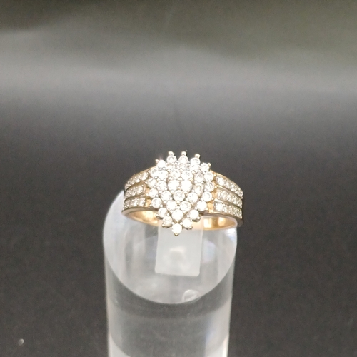 24 - Diamond Cluster Ring in a heart shape design with diamond set shoulders.
- 9 carat yellow gold
- wei... 