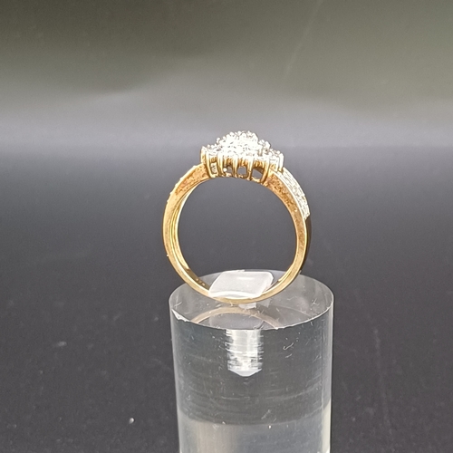 24 - Diamond Cluster Ring in a heart shape design with diamond set shoulders.
- 9 carat yellow gold
- wei... 