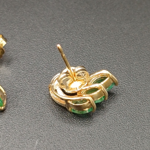 27 - Pretty Emerald and Diamond Stud Earrings set in 14 carat yellow gold weighing 2.28g