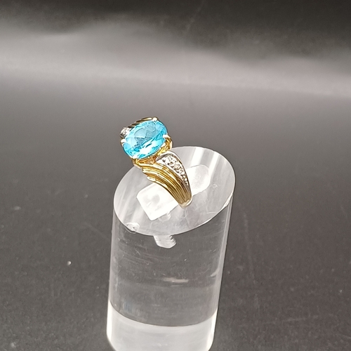 31 - Topaz and Diamond Ring set in 14 carat yellow gold.
- weight 3.66g
- size M / N