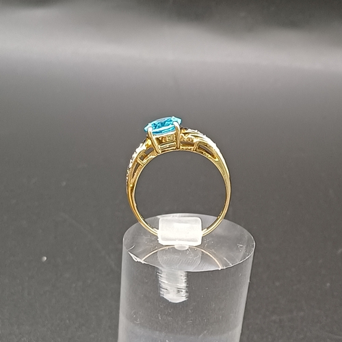 31 - Topaz and Diamond Ring set in 14 carat yellow gold.
- weight 3.66g
- size M / N