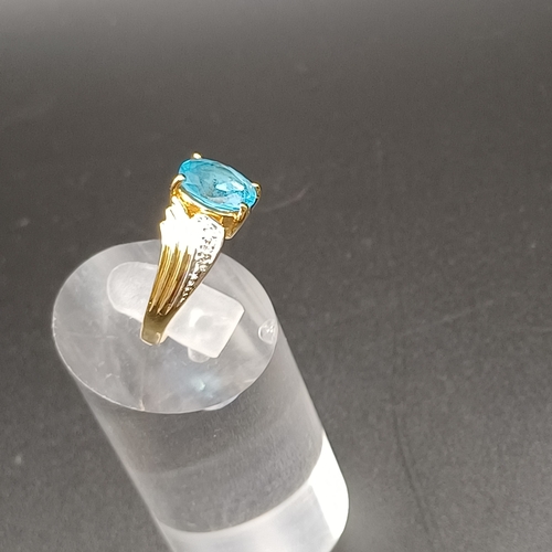 31 - Topaz and Diamond Ring set in 14 carat yellow gold.
- weight 3.66g
- size M / N