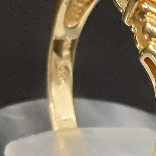 31 - Topaz and Diamond Ring set in 14 carat yellow gold.
- weight 3.66g
- size M / N