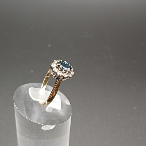 33 - Blue and White Sapphire cluster ring set in 9 carat yellow gold.
- weight 2.42g
- size K