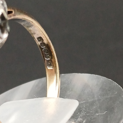 33 - Blue and White Sapphire cluster ring set in 9 carat yellow gold.
- weight 2.42g
- size K