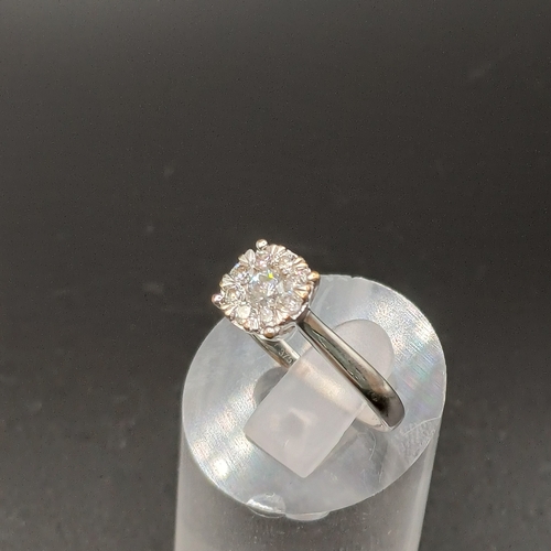 34 - Diamond Cluster Ring set in 9 carat white gold.
- weight 2.5g
- size M
- diamond carat weight 0.50
