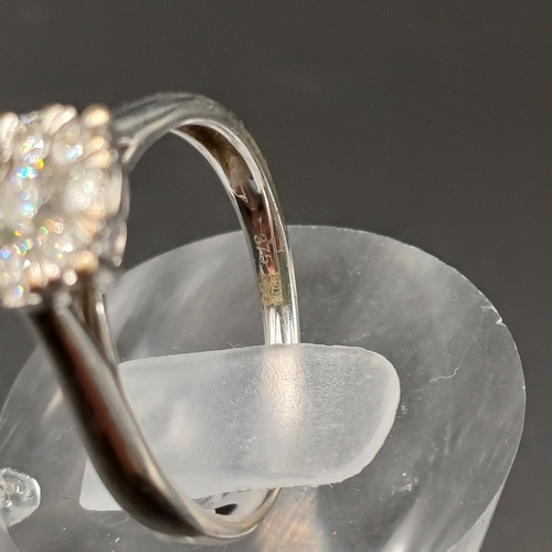 34 - Diamond Cluster Ring set in 9 carat white gold.
- weight 2.5g
- size M
- diamond carat weight 0.50