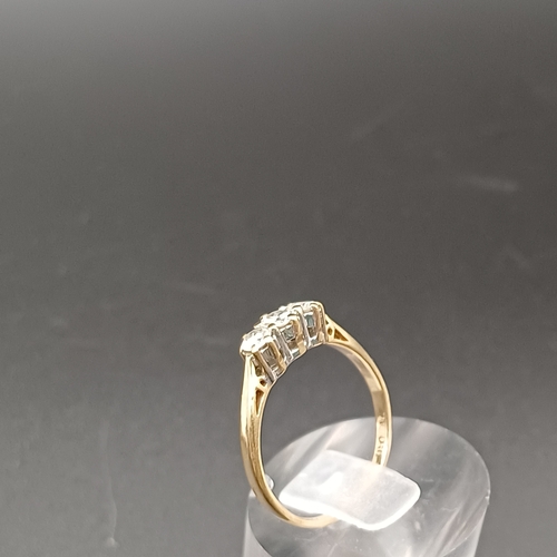 35 - Three Stone Diamond Ring set in 9 carat yellow gold.  
- weight 2g
- size O