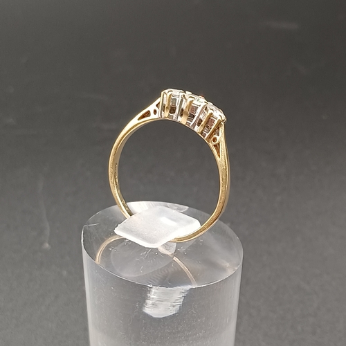 35 - Three Stone Diamond Ring set in 9 carat yellow gold.  
- weight 2g
- size O