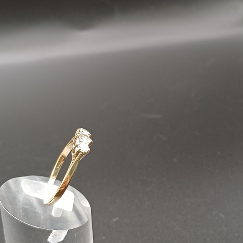 35 - Three Stone Diamond Ring set in 9 carat yellow gold.  
- weight 2g
- size O