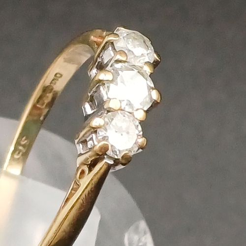35 - Three Stone Diamond Ring set in 9 carat yellow gold.  
- weight 2g
- size O