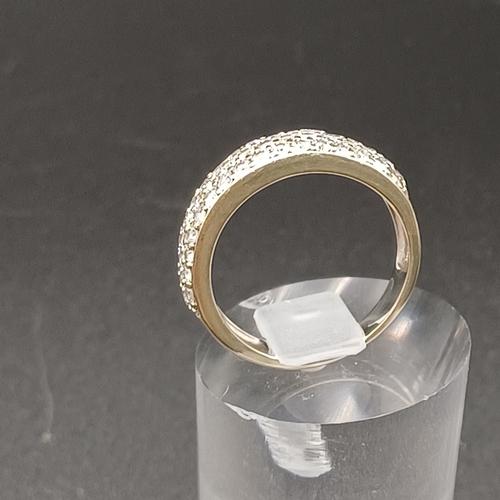 36 - Half Eternity Diamond Ring set in 14 carat white gold.
- weight 4.3g
- size N / O