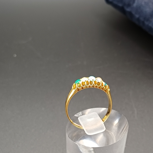 39 - Pretty Turquoise and Seed Pearl Ring set in 18 carat yellow gold.
- weight 2.61g
- size M / N