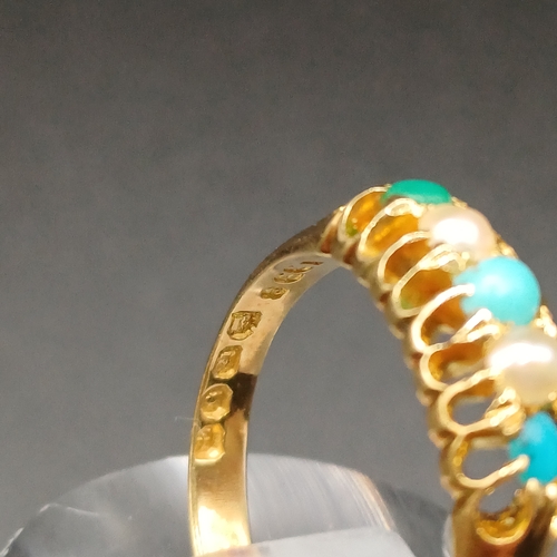 39 - Pretty Turquoise and Seed Pearl Ring set in 18 carat yellow gold.
- weight 2.61g
- size M / N