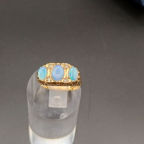 40 - Opal and Diamond Ring set in 9 carat yellow gold.
- weight 4.30g
- size L