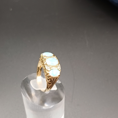 40 - Opal and Diamond Ring set in 9 carat yellow gold.
- weight 4.30g
- size L