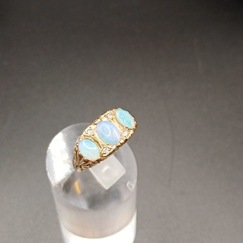 40 - Opal and Diamond Ring set in 9 carat yellow gold.
- weight 4.30g
- size L