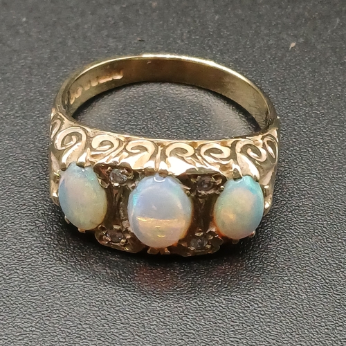 40 - Opal and Diamond Ring set in 9 carat yellow gold.
- weight 4.30g
- size L