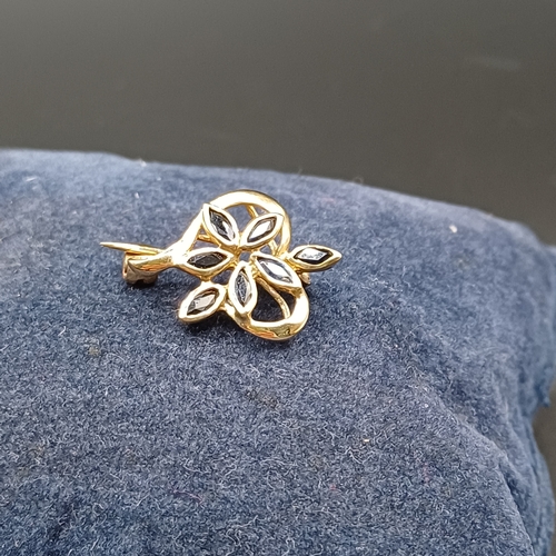 41 - Pretty Sapphire Brooch set in 9 carat yellow gold weighing 2g